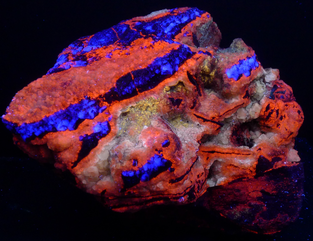 Blue fluorite, orange/white calcite; short/longwave; 15 cm